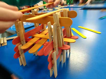 lolly stick and clothes peg tower